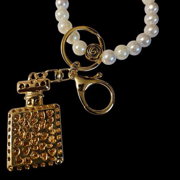 Champagne color Rhinestone Perfume Bottle Key Chain Purse Pull Unbranded - Picture 2 of 5